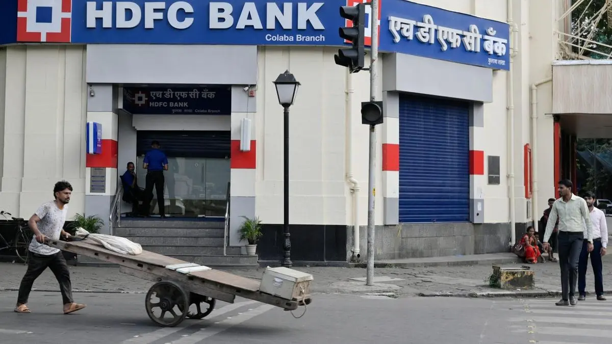 HDFC Bank shares trade flat near day’s high